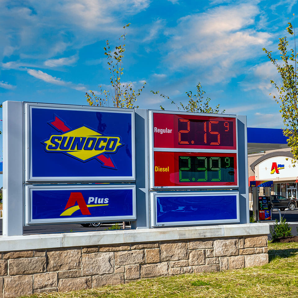 Fuel prices on signage outside Aplus store