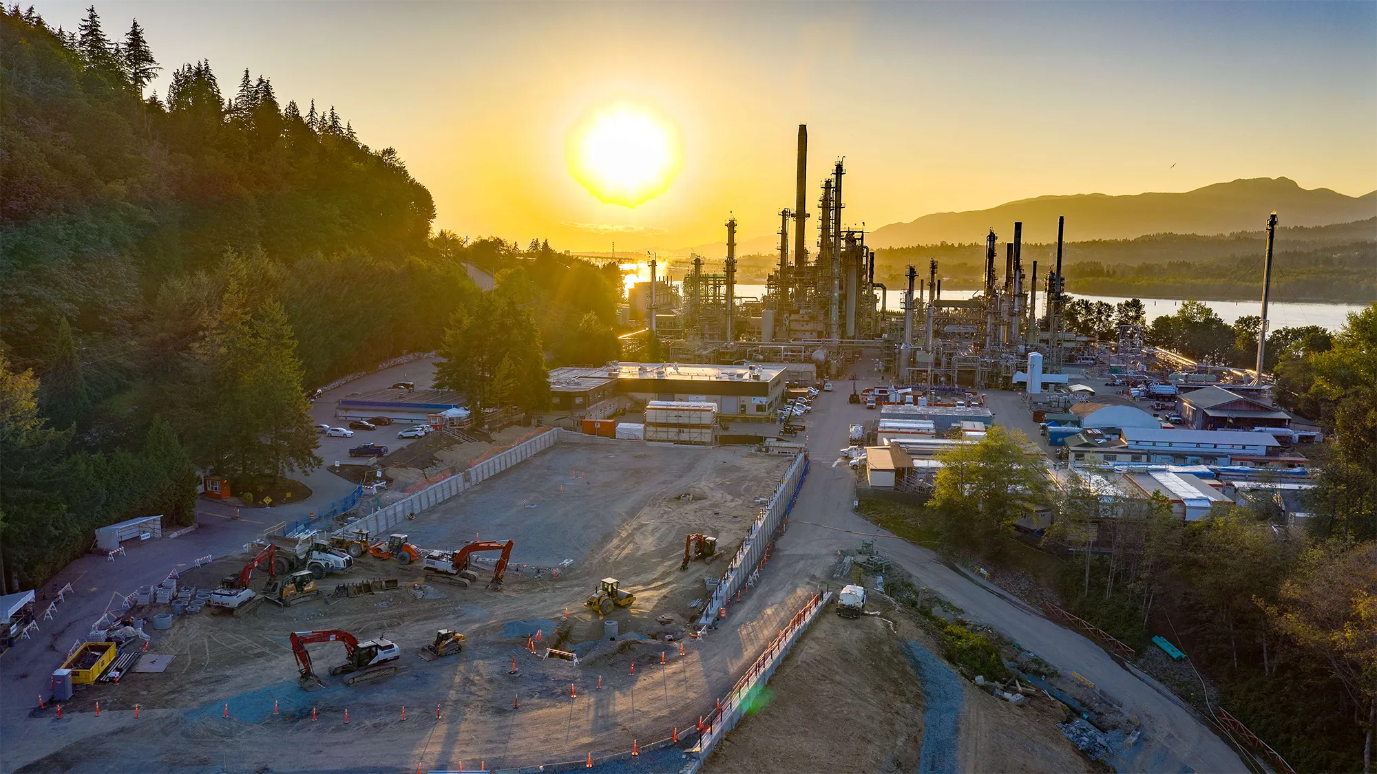 Burneby refinery construction at sunset