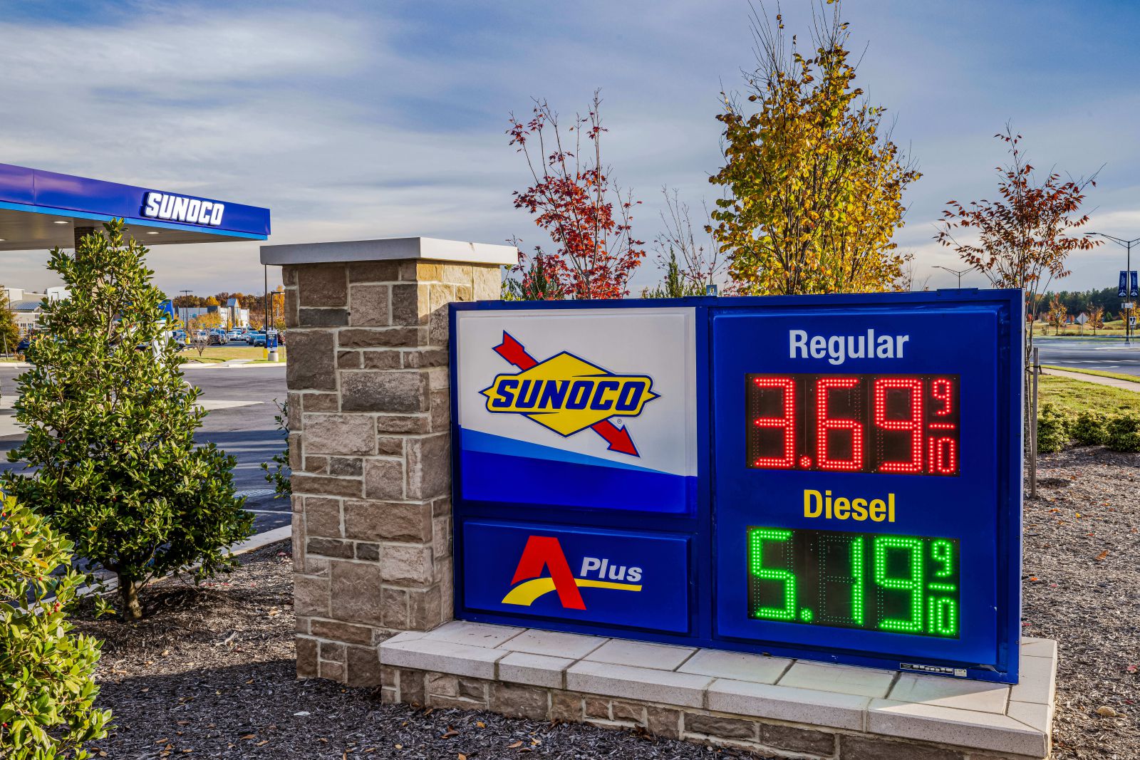 Fuel prices on signage outside Aplus store