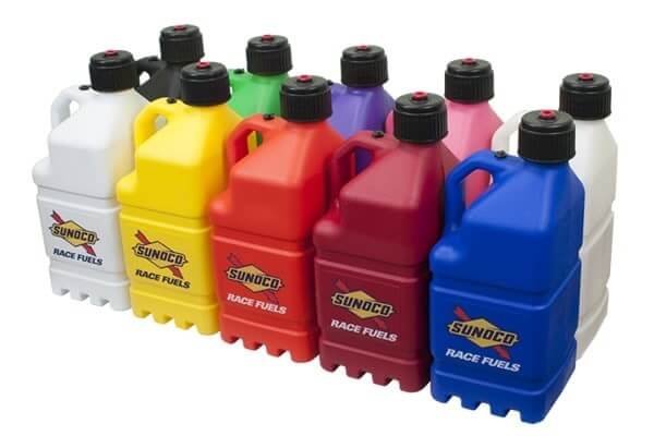 Various Sunoco race jugs in a row